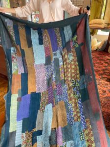 High Point Market Fall 2020. Aloka booth. Beautiful patchwork quilt.