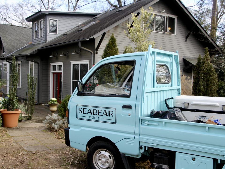 Seabear Shuck Truck parked outside a house